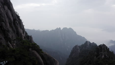 huangshan  aerial reveal over mountainous landscape, anhui china