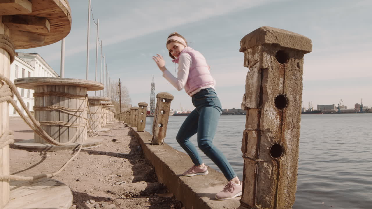 Female Performer Dancing by Lakeshore