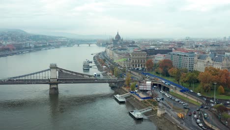 danube riverside aerial view with ships, széchenyi chain bridge and buda castle, hungary