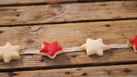 christmas cookies arranged on wooden table 4k