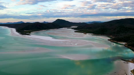 rising drone shot whitehaven beach along whitsunday island australia