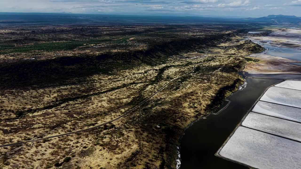 Lake Magadi kenya Sodaash Alkaline water salt lake Trona mineral deposits rift valley kenya . kenyan lake with Trona.