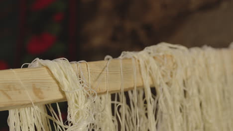 homemade tenili cheese hanging for drying, chobareti, georgia, close up pan