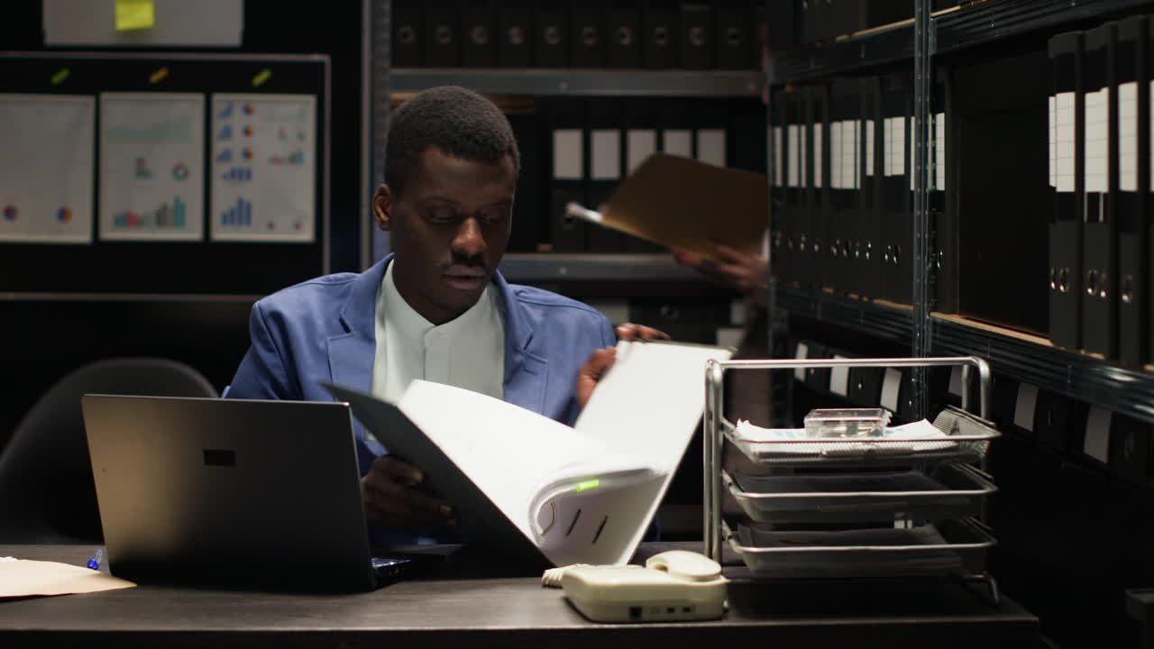People working in an office archive