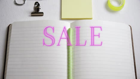 animación de texto de venta sobre cuadernos y artículos escolares