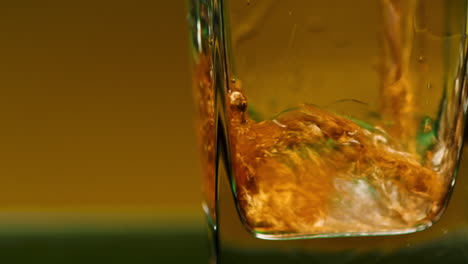 close-up of drinks being poured