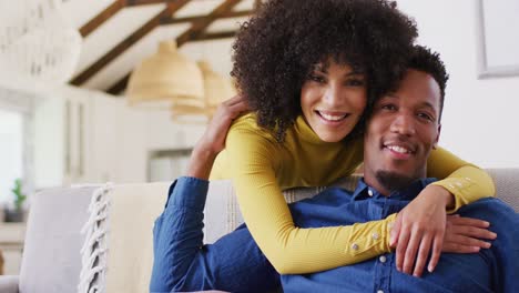 Happy-african-american-couple-dancing-and-holding-hands