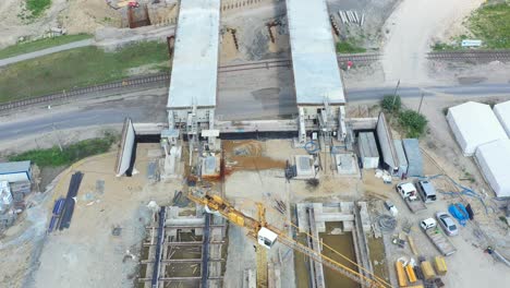 aerial view of the construction of the bridge and the highway passing