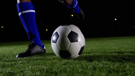 Soccer-player-kicking-the-ball-4k