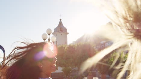 two woman explore adventure summer vacation town