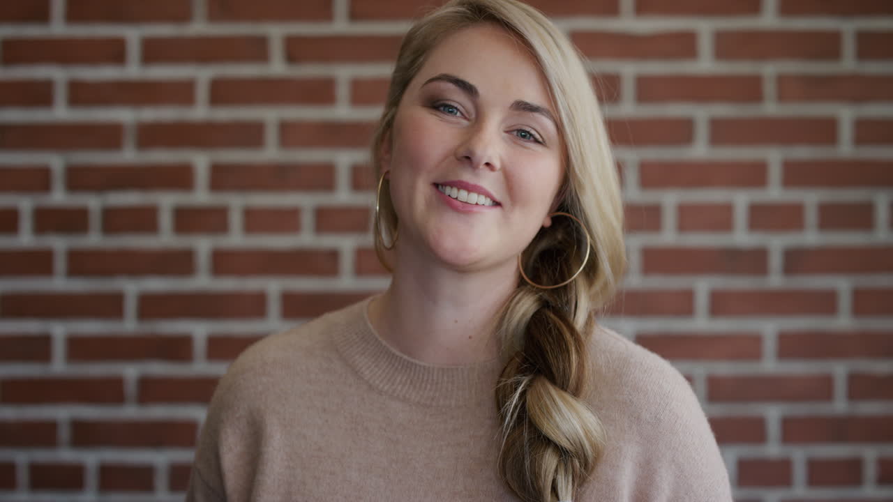 portrait beautiful young blonde woman smiling happy successful female student enjoying lifestyle slow motion