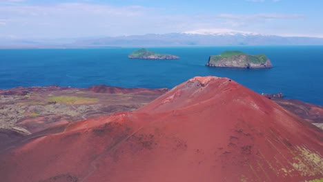 good aerial of eldfell volcano looming over heimaey in the westman islands vestmannaeyjar iceland  4