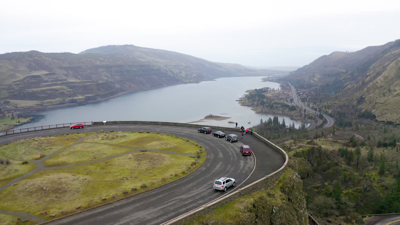 Winding Road Overlook of a River Valley and Mountains