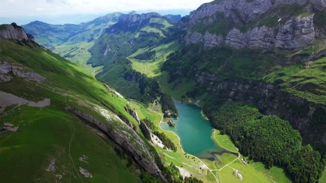 4k drone aerial panning shot of seealpsee lake near shäfler ridge in appenzell region of switzerland