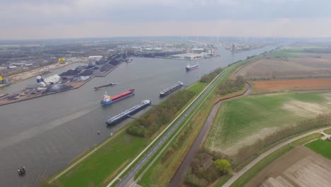 Cargo-ships-at-the-port-of-Terneuzen,-Netherlands,-going-to-Ghent-in-Belgium