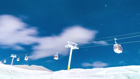 snow capped ski resort at night in georgia mountain tbilisi in winter season with cable car red colored at dark black night and freezing cold climate in mountain in caucasus north of iran