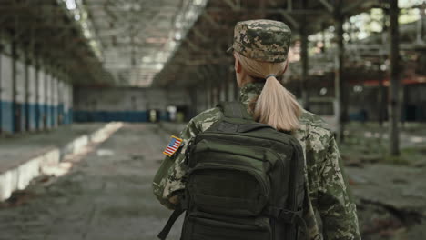 soldier in a damaged factory