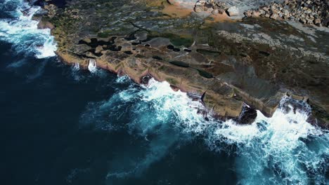 figure 8 pool, australia, drone flyby shot of entire rock platform