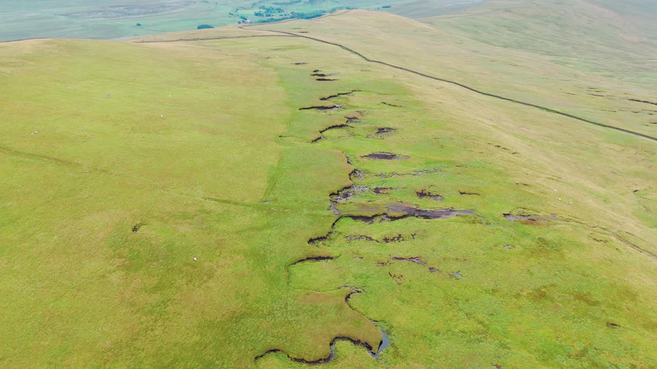 Aerial View of Moorland Landscape with Streams