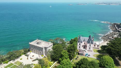 dinard brittany france azure, crystal clear sea large house on cliff top drone,aerial