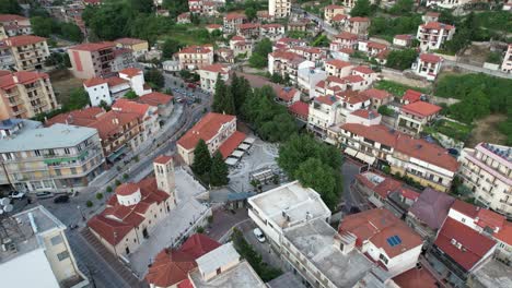 karpenisi town center aerial drone view, scenic urban landscape with streets and buildings, in central greece