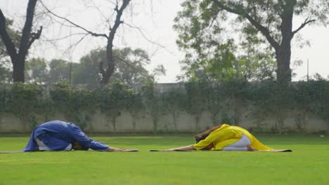 Indian-couple-practicing-yoga-together