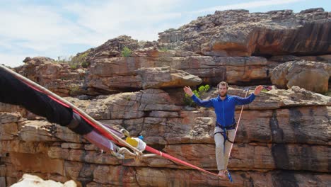 mountaineer starts walking on the tightrope 4k