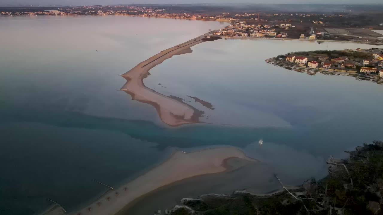 Drone flight over the sea Plaza Ninska laguna in Croatia city Nin