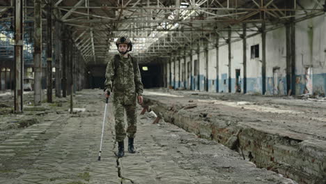 injured soldier in a ruined factory