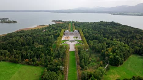 A-View-of-Herrenchiemsee-Situated-on-Chiemsee-Lake-in-Bavaria,-Germany---Drone-Flying-Forward