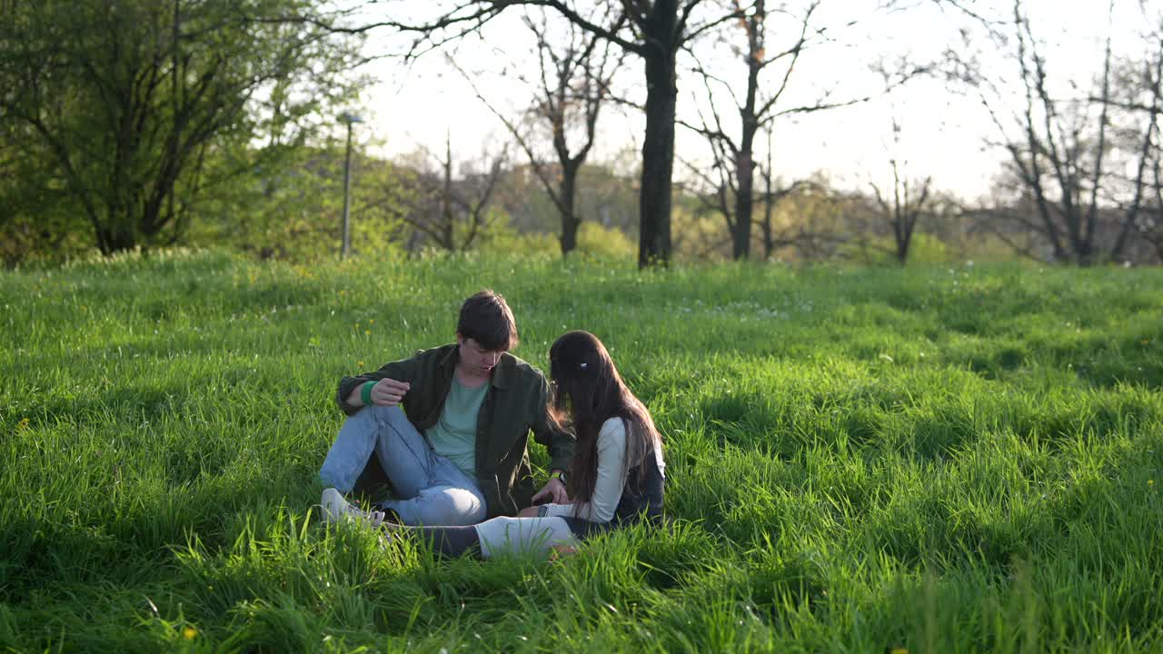 Young Couple Relaxing in a Park