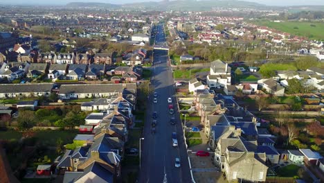 troon city in scotland. aerial tilt-up flyback