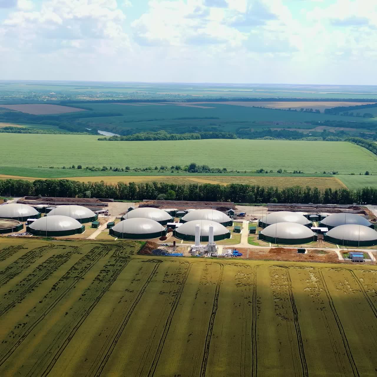 Aerial view of biogas plant. Aerial view of big biogas plant in fields