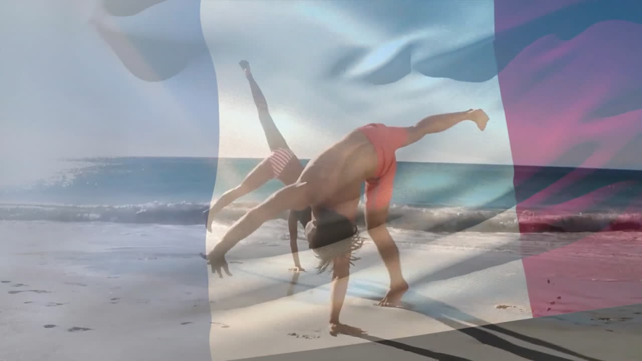 haciendo ruedas en la playa con la animación de la bandera francesa en el fondo