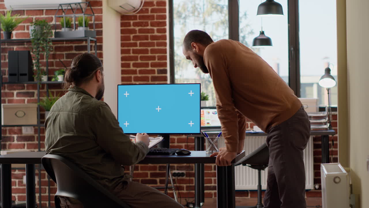 Team of people using computer with greenscreen and brainstorming ideas