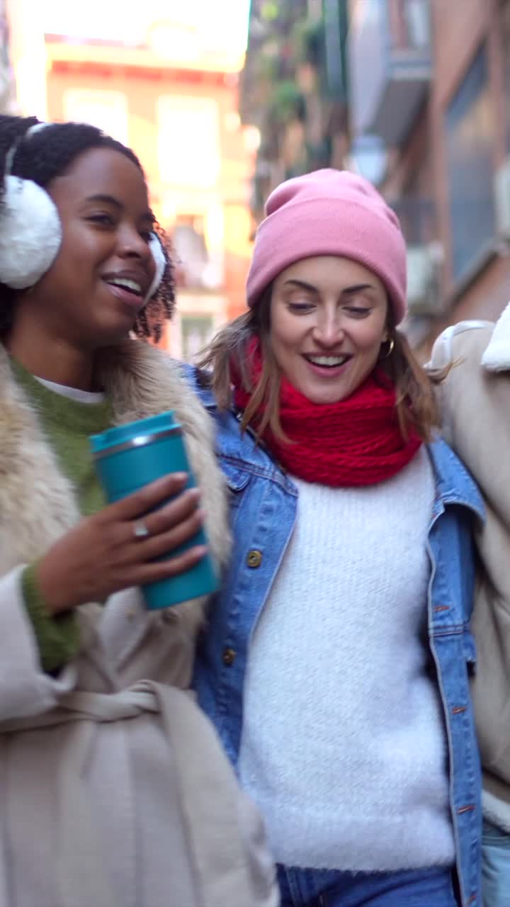 Friends Walking Together in Winter Outfits