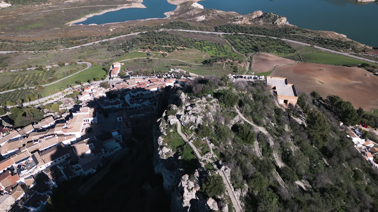 Stone watchtower of Zahara de la Sierra and cityscape, aerial view