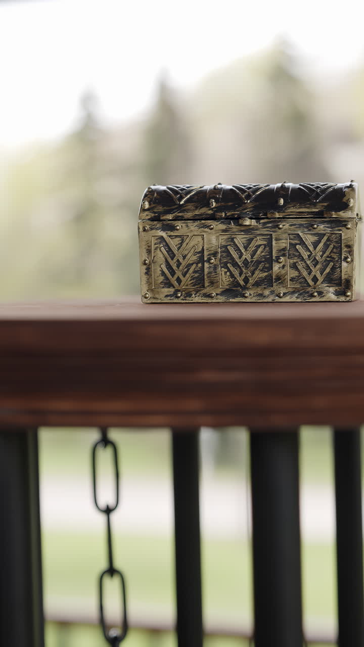 Small Decorative Chest on a Wooden Deck