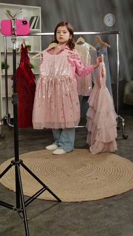 cute girl modeling kids dresses