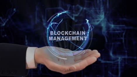 painted hand shows blockchain management