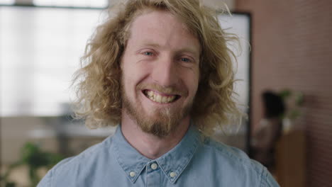 close up portrait of young charming blonde businessman entrepreneur smiling cheerful enjoying successful start up business opportunity