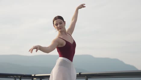 elegant dancer in slow motion on rooftop