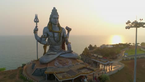 murudeshwar shiva statue drone shot by sea sunset south india drone