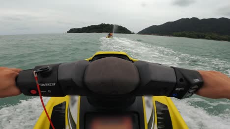 point of view, pov, ridding jet ski at the sea