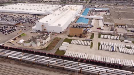 lorry truck driving at the premises of fca stellantis assembly plant in an industrial park in sterling heights, michigan