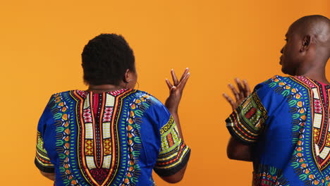 Back-view-of-african-american-people-stopping-each-other