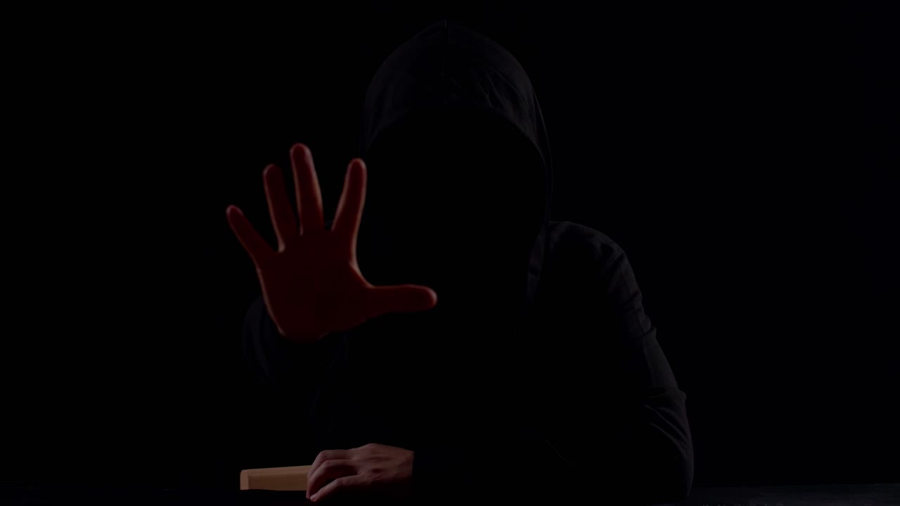 Hacker Showing Stop Hand