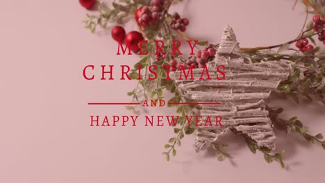 Animation-of-merry-christmas-text-over-christmas-decorations