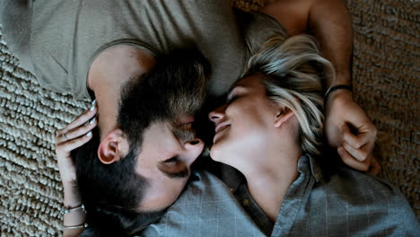 couple lying upside down in living room 4k