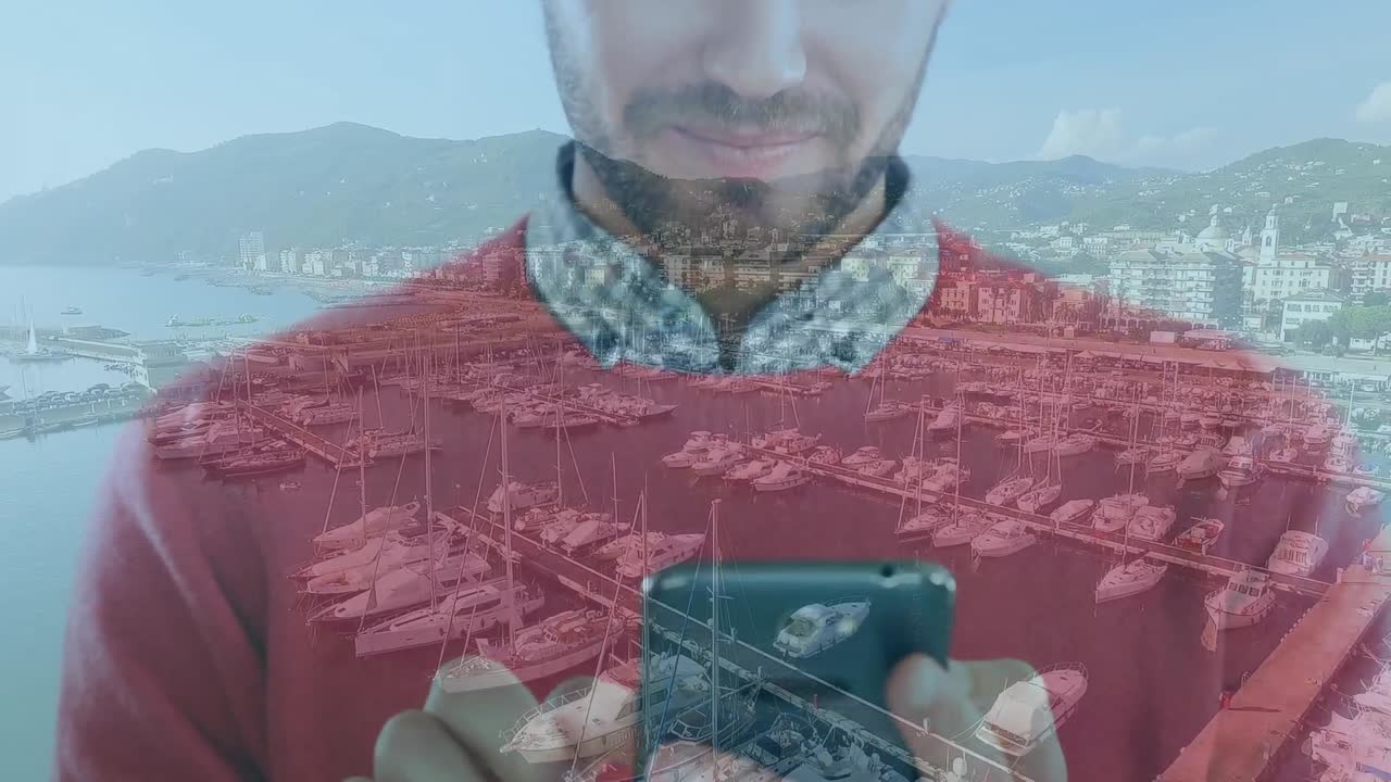 Animation of man using smartphone over cityscape